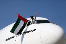 Emirati-pilot-raised-the-UAE-flag-upon-landing-in-Bologna_-Italy-to-mark-the-new-route-and-UAE-Flag-Day.jpg