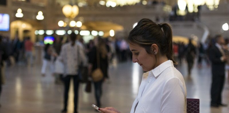 woman-looking-at-her-phone-at-grand-central-station-in-new-york---roy3775-2-5.jpg