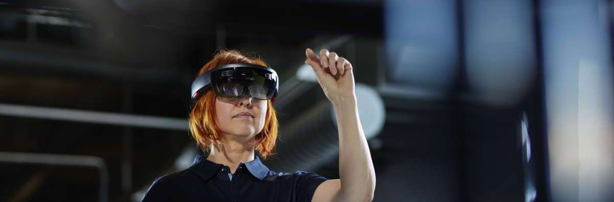 Woman in factory using AR_